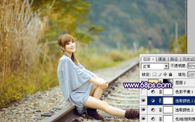 Photoshop调制出淡黄色的秋季铁轨小清新美女图片
