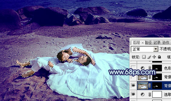 Photoshop将沙滩婚片打造出经典暗蓝色效果