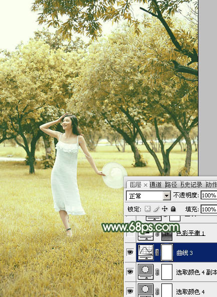 Photoshop将树景人物图片打造灿烂的黄绿色