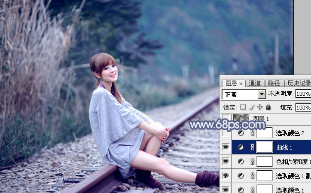 Photoshop为铁轨上的美女加上梦幻甜美的蓝色效果