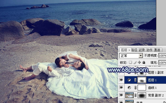 Photoshop将沙滩婚片打造出经典暗蓝色效果