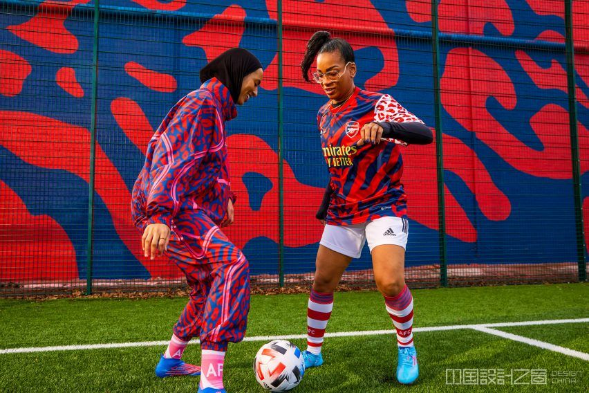 Two women playing football in Stella McCartney for Adidas kits