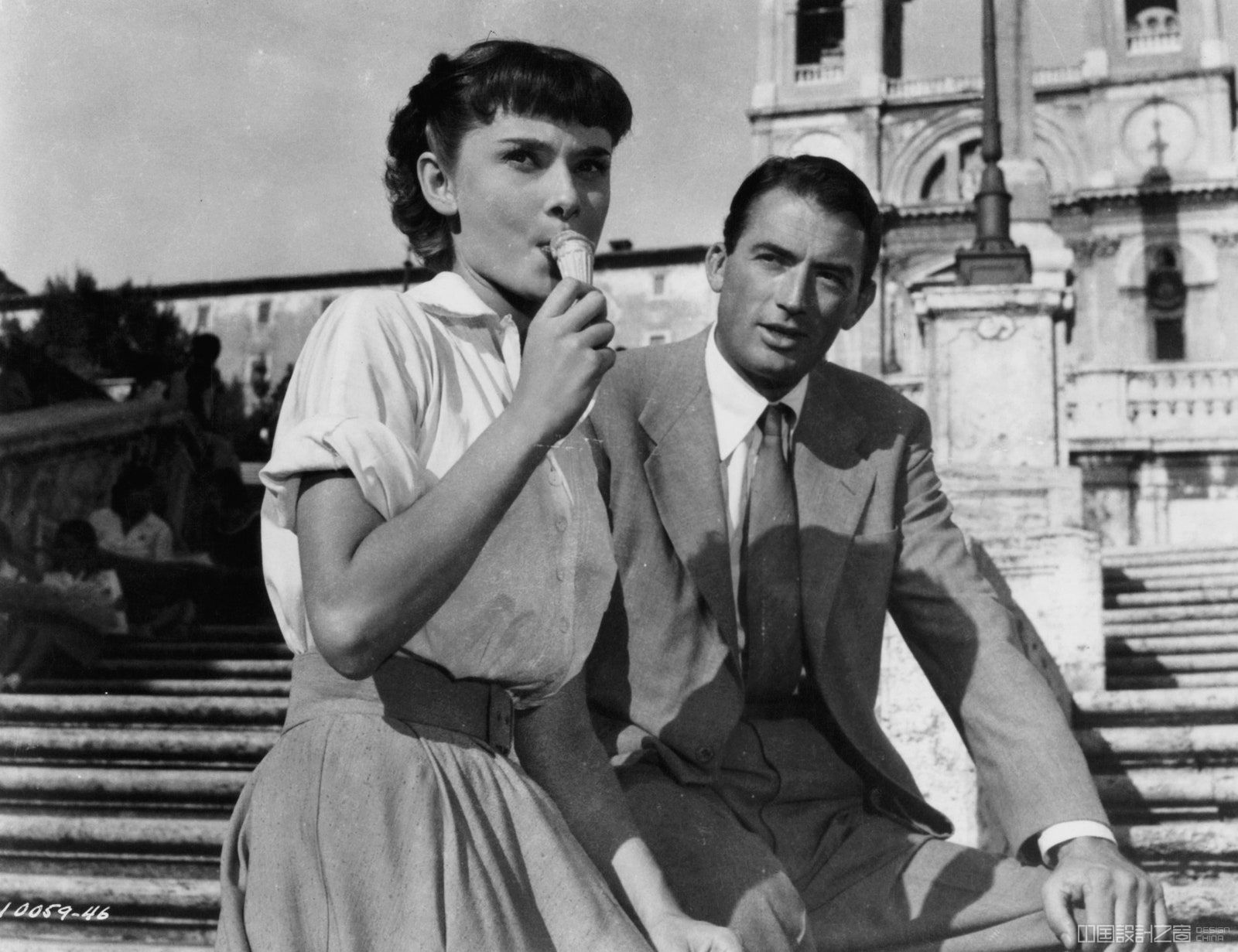 Audrey Hepburn eats gelato with Gregory Peck in a scene from the 1953 film Roman Holiday.