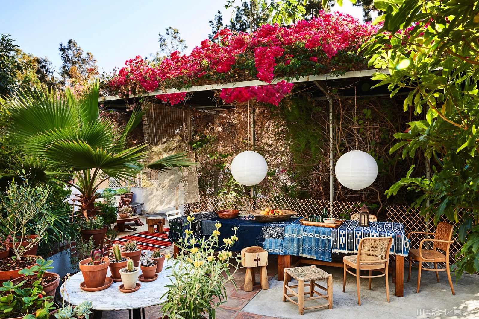 outdoor dining space with arbor