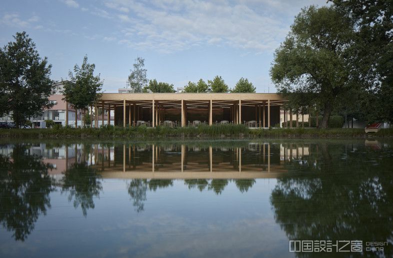 The restaurant overlooks a body of water. - BoysPlayNice