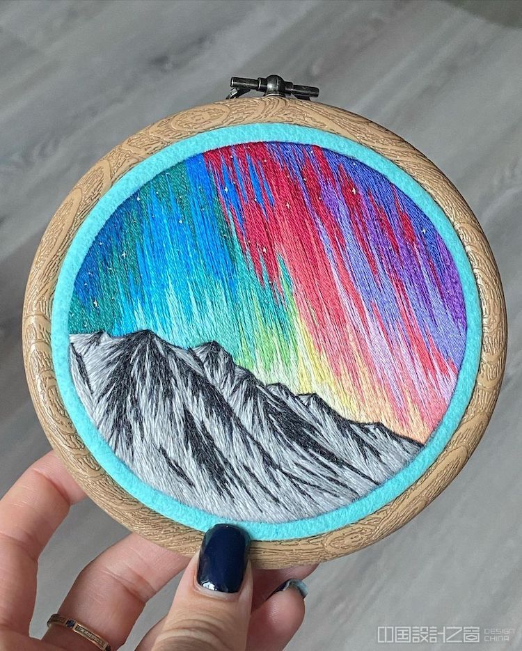Hoop Art Featuring Northern Lights Over Mountains