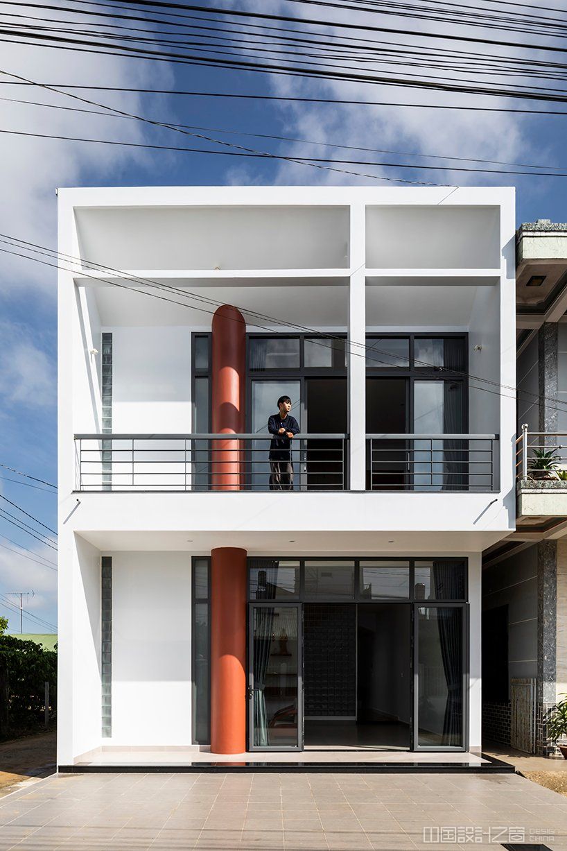 two ample voids afford openness and interaction for family house in vietnam