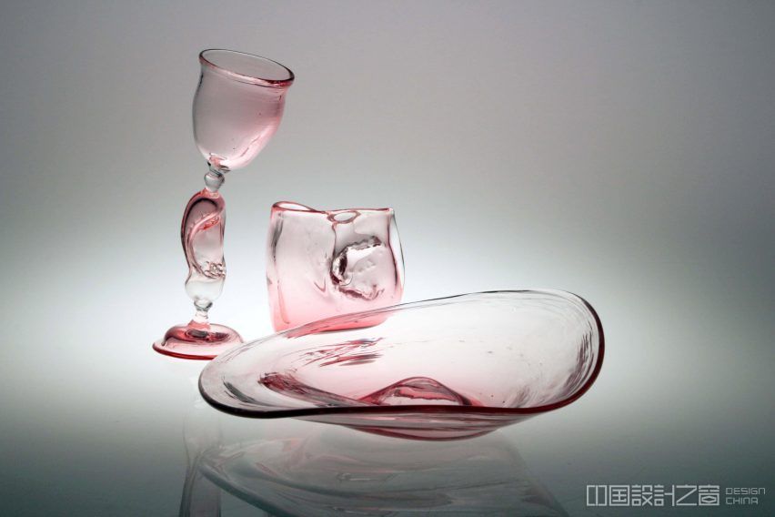 Three pink-hued glass objects