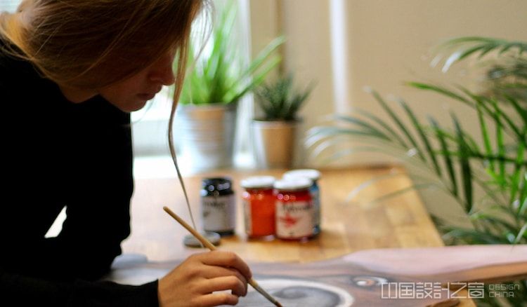 Woman Painting a Portrait of an Animal