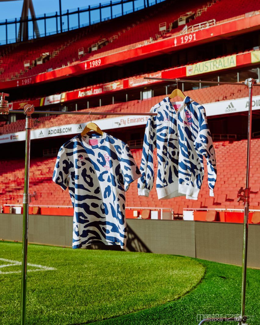 A football hoody and shirt on a pitch