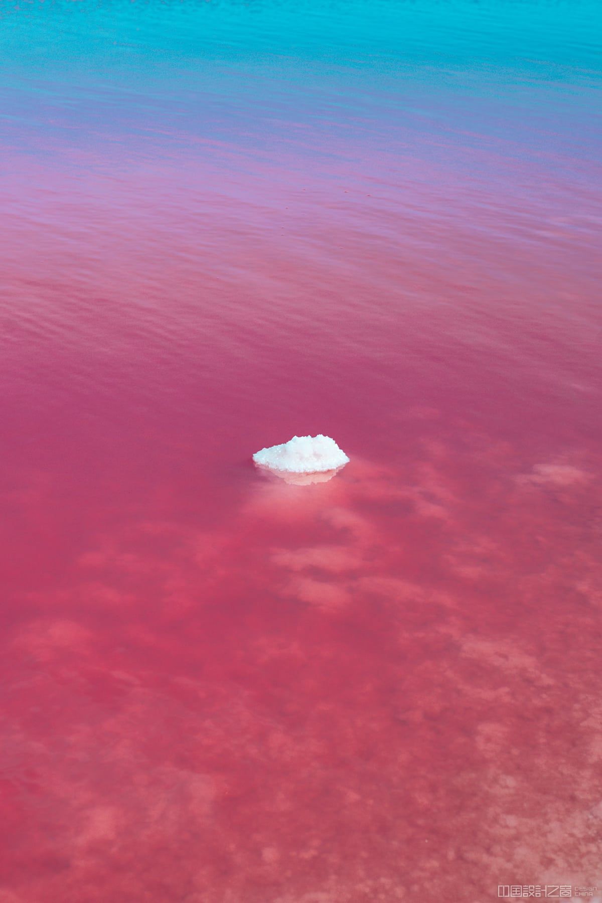 Road cutting across sea and salt field