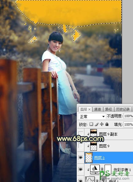 Photoshop给景区木桥上拍摄的中年女人写真图片调出唯美的曦色