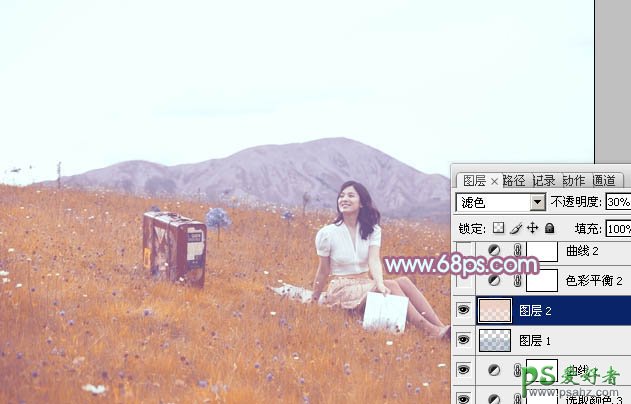 photoshop给草地上的美女图片调出淡淡的蓝红色