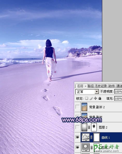 photoshop给一幅沙滩上美女走光图调出漂亮的淡蓝色