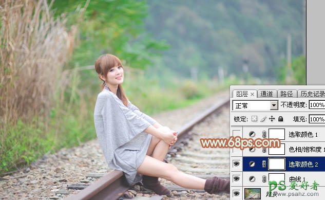 Photoshop图片调色实例教程:给铁轨上自拍的甜美女孩儿调出青绿色