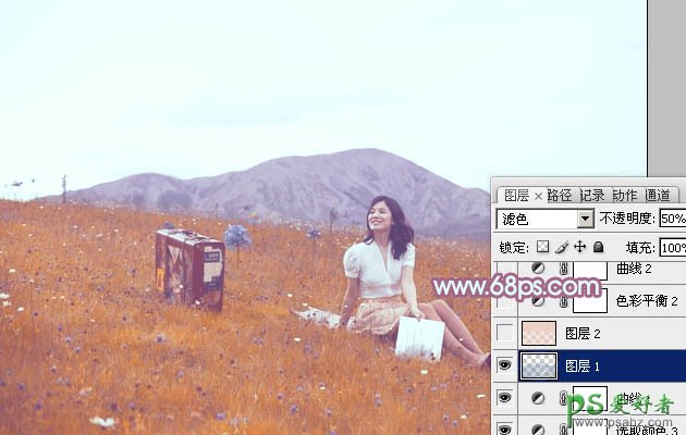 photoshop给草地上的美女图片调出淡淡的蓝红色