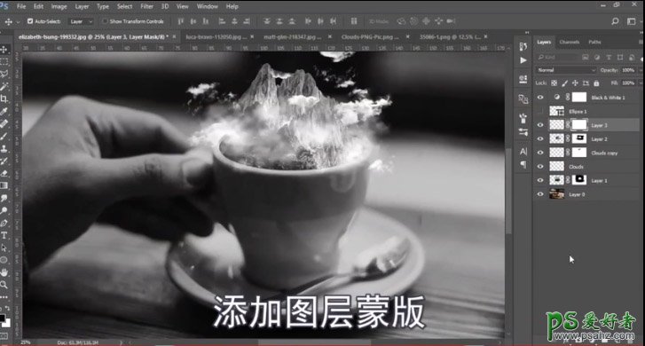 Photoshop创意合成咖啡杯中的云雾雪山梦幻场景。