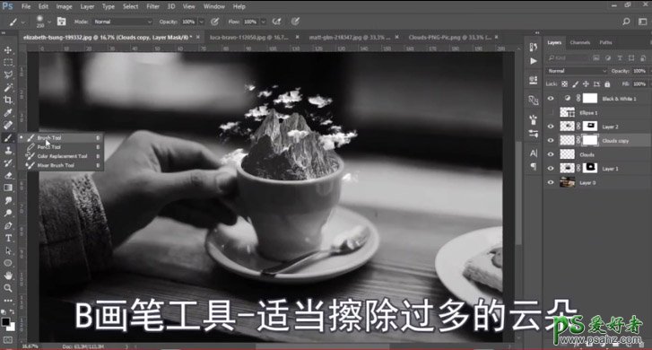 Photoshop创意合成咖啡杯中的云雾雪山梦幻场景。