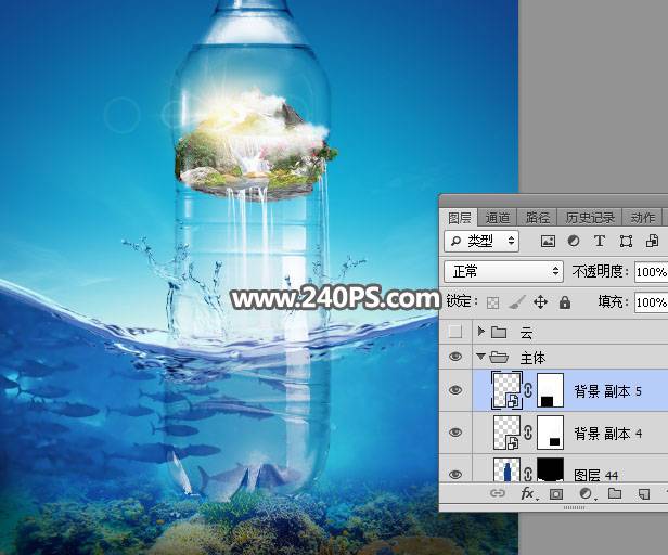 PS合成海面上巨大矿泉水瓶中的海岛图片