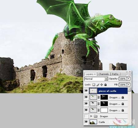 PS怎样合成趴在城堡上的绿色翼龙图片