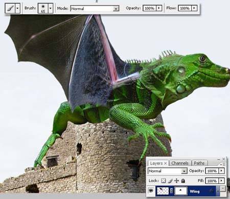 PS怎样合成趴在城堡上的绿色翼龙图片