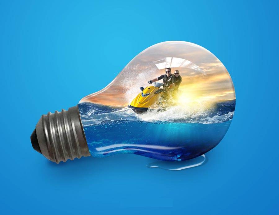 PS合成创意灯泡中飞驰的摩托艇图片